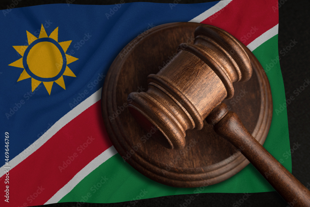 Judge Gavel and flag of Namibia. Law and justice in Namibia. Violation of rights and freedoms