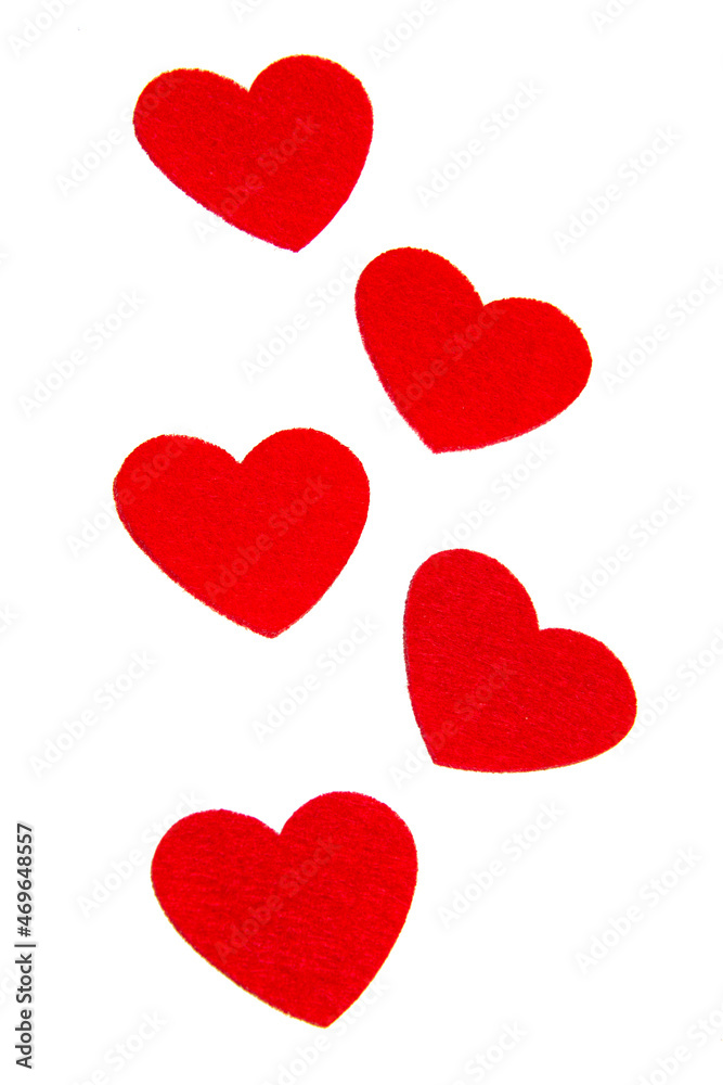 Red felt hearts love decor isolated on the white background