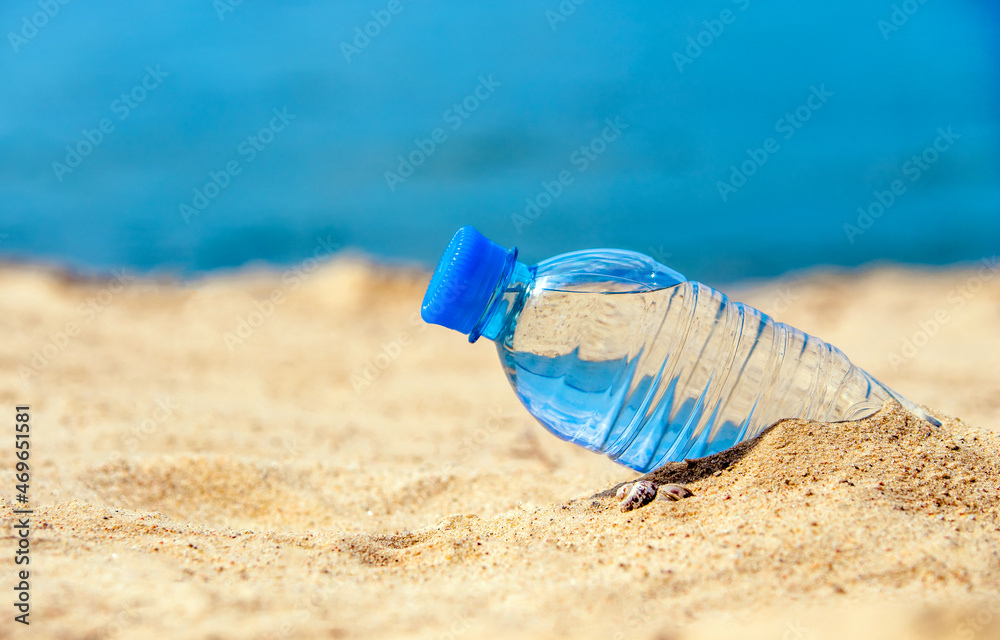 A bottle of drinking water on the sea beach
A bottle of drinking water on the sea beach