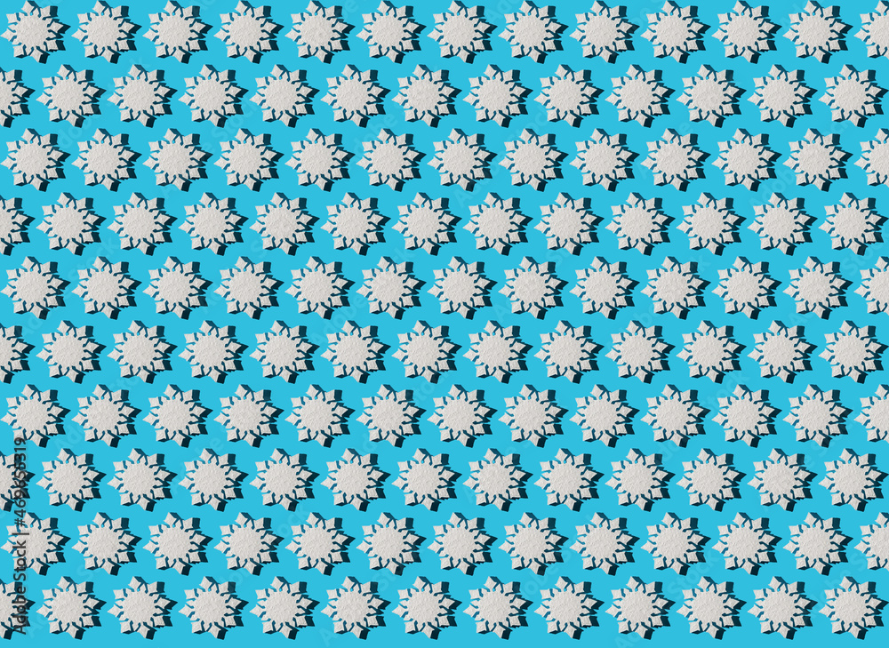 Christmas background. Snowflake pattern. White snowflakes on blue. Snow. Winter mood. Conceptual abstraction. Styrofoam snowflake. New Year's pattern. Copy space. Christmas background. Snowflake pattern. White snowflakes on blue. Snow. Winter mood. Conceptual abstraction. Styrofoam snowflake. New Year's pattern. Copy space.