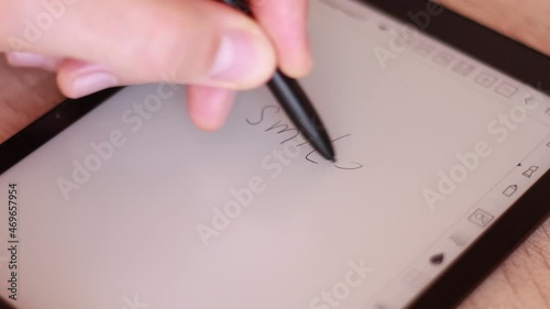Writing SMILE in digital tablet