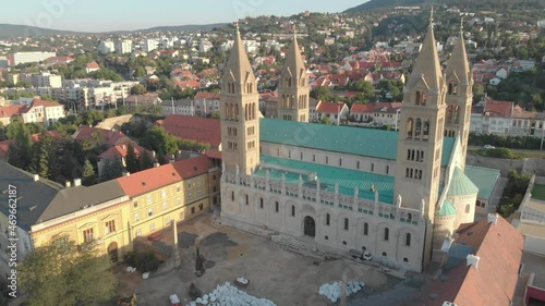 Cinematic 4K aerial drone clip of the Cathedral in Pécs in Southern Hungary, a major cultural center, on the slopes of the Mecsek mountains, administrative, economic center of Baranya County photo