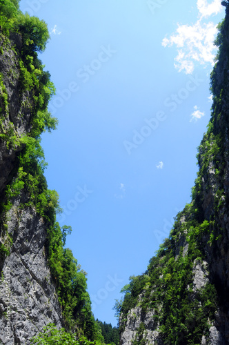 A gorge in the mountains on a clear summer day.