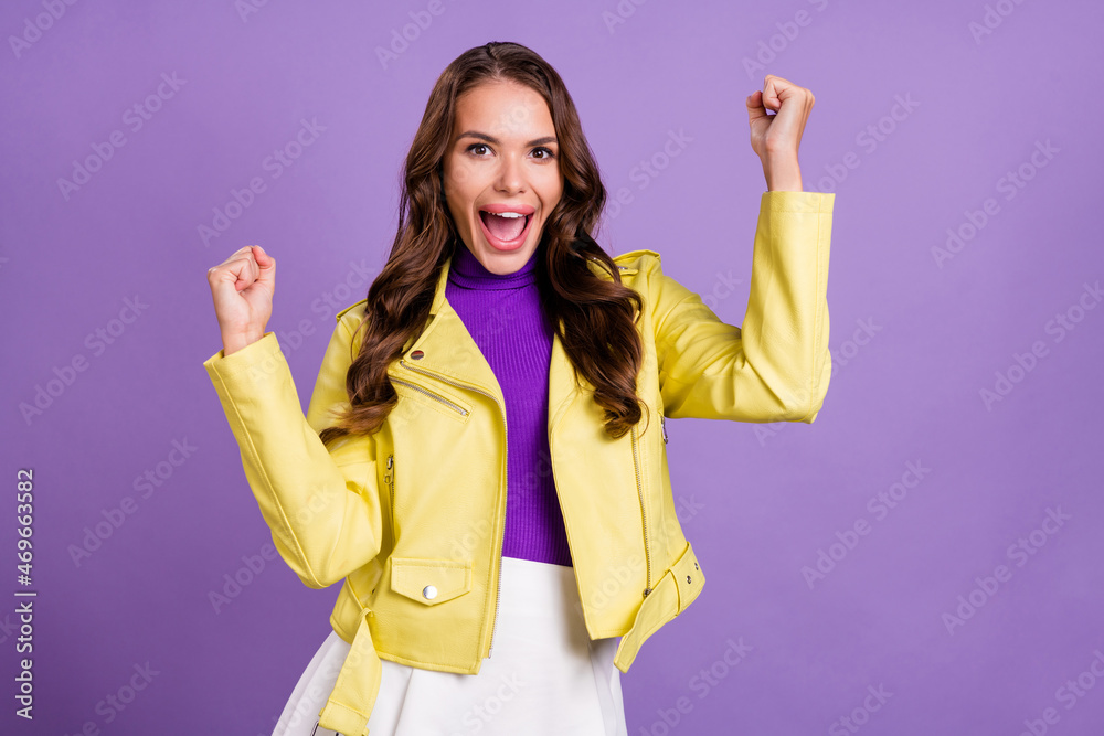Photo of young lady celebrate victory fists hands discount champion isolated over violet color background Photo of young lady celebrate victory fists hands discount champion isolated over violet color background