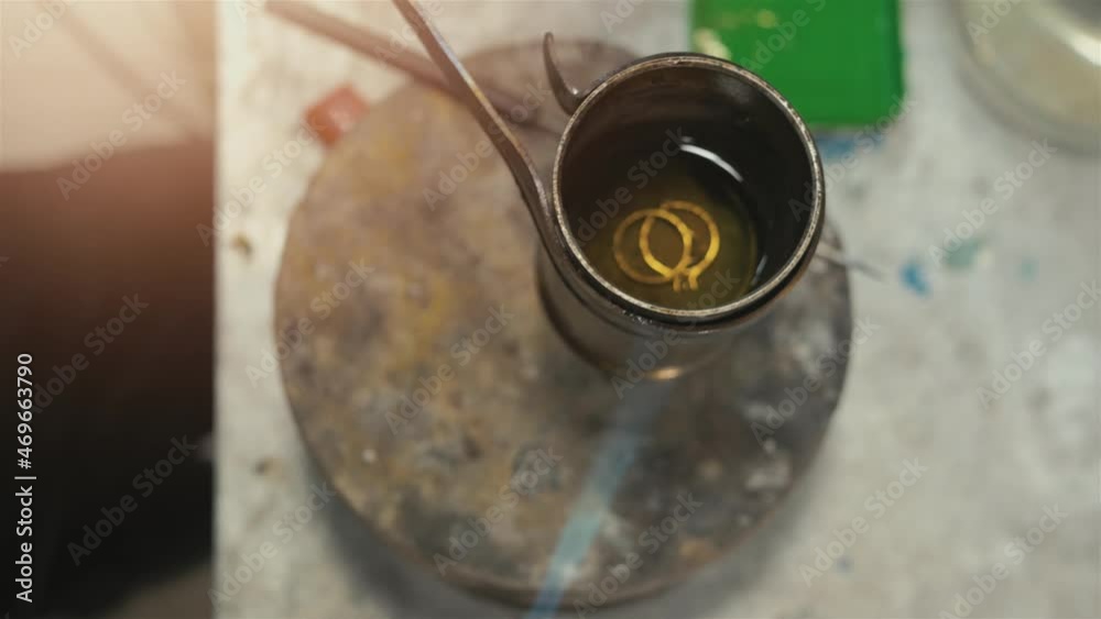 Jewelry workshop, a master makes a piece of gold. Craft work Jewelry workshop, a master makes a piece of gold. Craft work