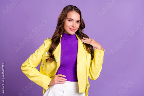 Photo of young lovely elegant girl confident hand touch shoulder isolated over violet color background