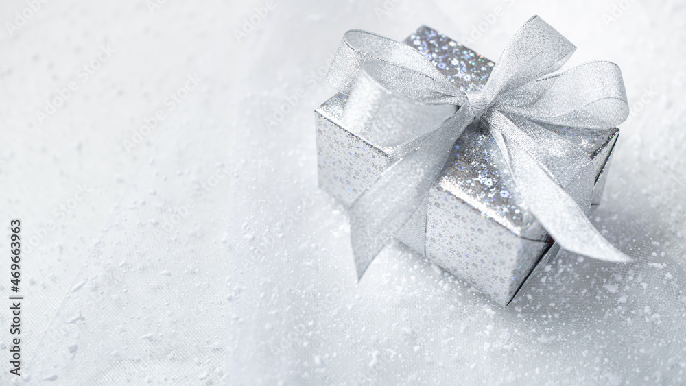 Silver Christmas gifts on clear background. silver decorations on pastel silver background. Flat lay, top view, Presents for Birthdays. Boxes with gifts tied with ribbon and bows. happy new year 2022 Silver Christmas gifts on clear background. silver decorations on pastel silver background. Flat lay, top view, Presents for Birthdays. Boxes with gifts tied with ribbon and bows. happy new year 2022