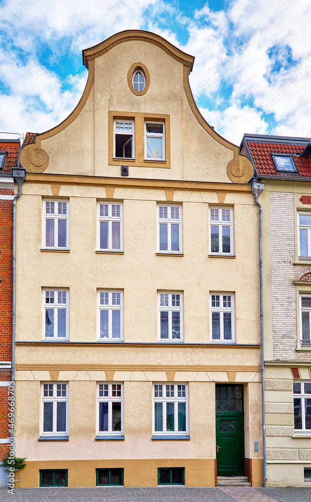 Fototapeta premium Modernized old gabled house facade in the city of Wismar.