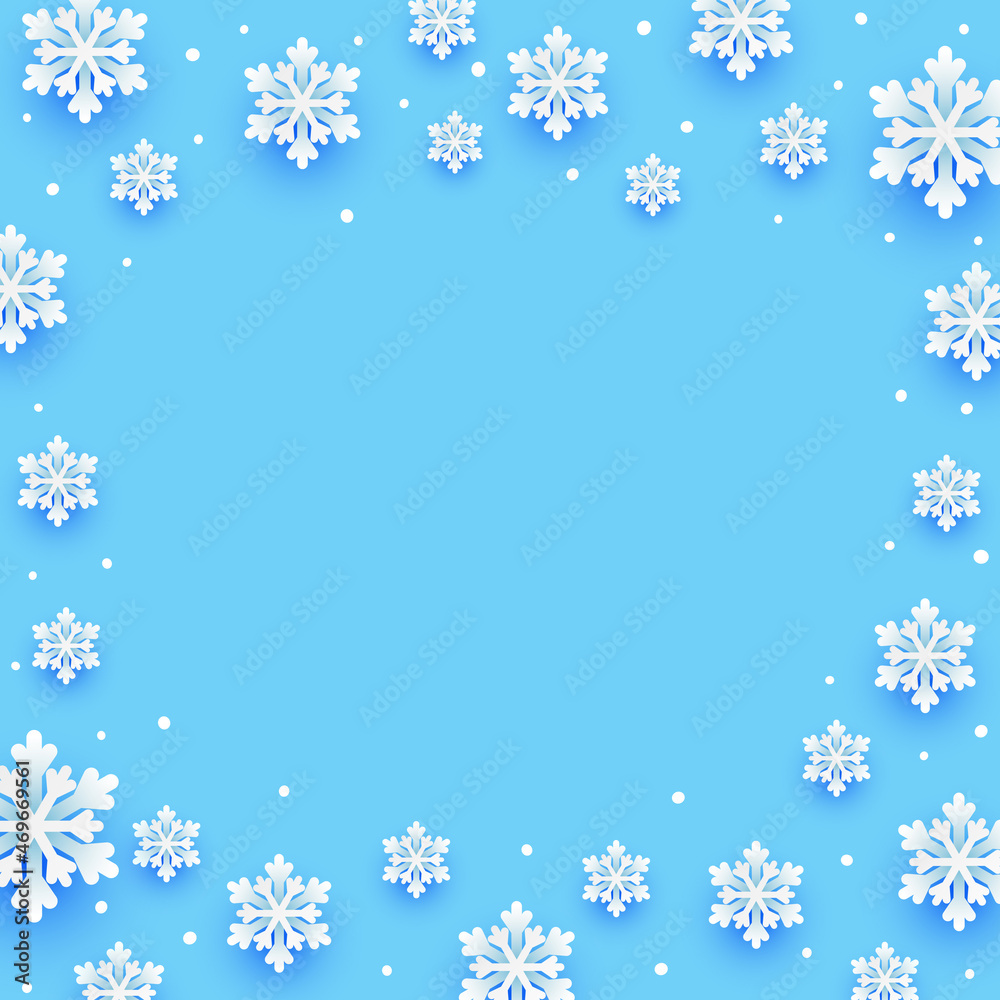 Paper snowflakes Christmas frame on blue background for winter holidays design Paper snowflakes Christmas frame on blue background for winter holidays design