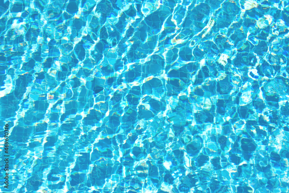 Surface of blue water in the pool, top view. Сopy space. Template for your design.