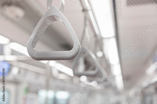 Handle hand straps in public transportation for passenger safety.