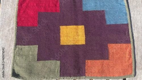 Inca Cross Design On Traditional Handwoven Peruvian Textile. Andean Culture. close up photo