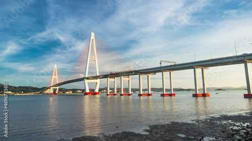 Shantou City, Guangdong Province, China. Chinese translation on the bridge:Shantou Queshi bridge photo