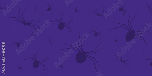 Silhouette of violet spiders for Halloween background. Simple set of spider vector icons for web design on violet background