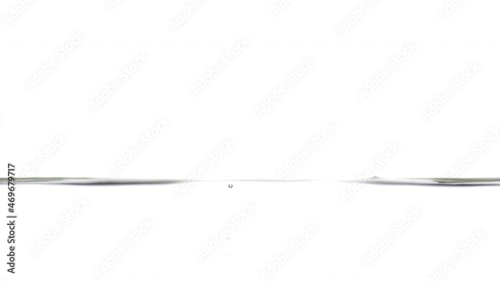 Grey drop falls down on grey transparent liquid surface creating ripples on it on white background | Abstract skin moisturizing cosmetics mixing concept Grey drop falls down on grey transparent liquid surface creating ripples on it on white background | Abstract skin moisturizing cosmetics mixing concept