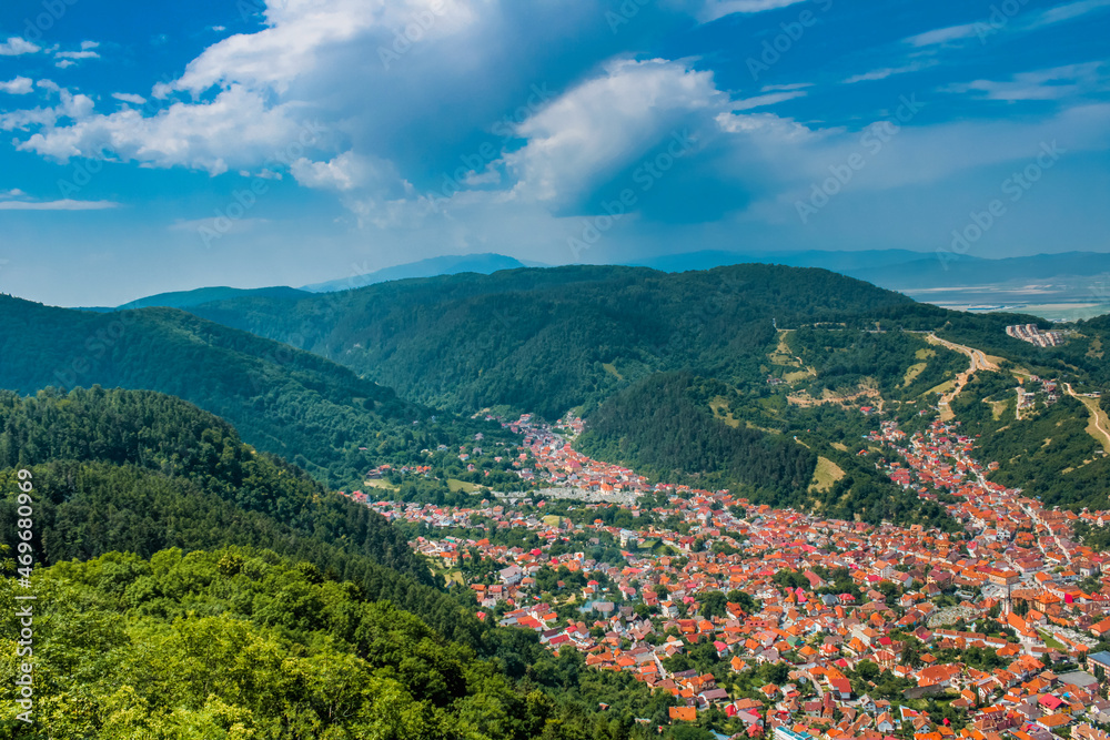 city Brasov in mountains aerial view, Romania