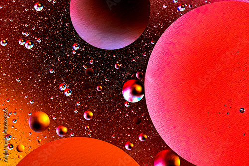Abstract colorful background of oil circles. Oil in the water surface circles  water foam and oil bubbles.