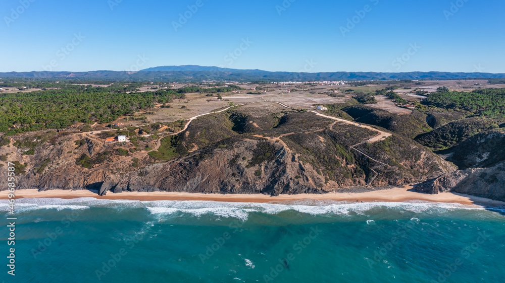 Aerial view of the Portuguese mountain coastline, Vicentina. Aljezur village, beach Vale dos Homens. Sagres