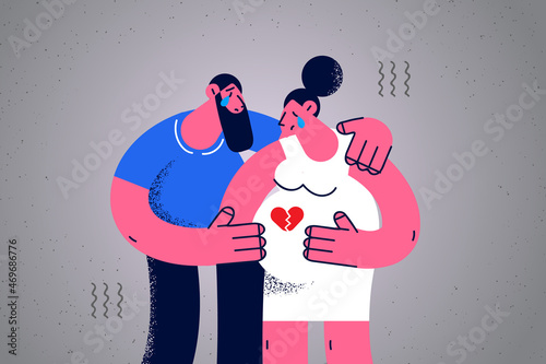 Upset couple cry feel depressed having miscarriage 