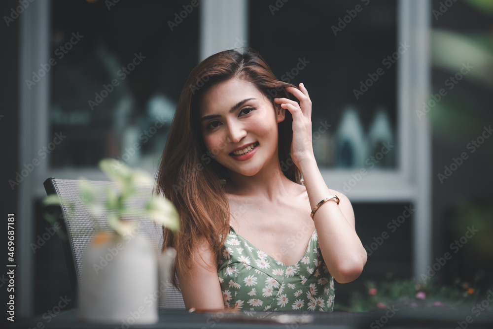 Portrait of young Asian beautiful cute girl in cafe, lifestyle concept.