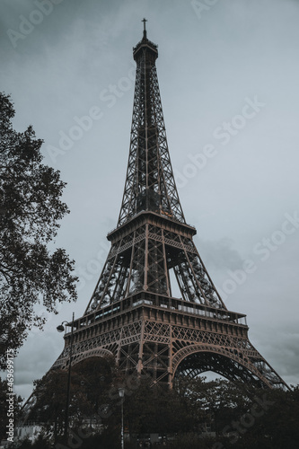 Fototapeta Naklejka Na Ścianę i Meble -  Autumn, cloudy Eiffel Tower in Paris, in the evening without lighting