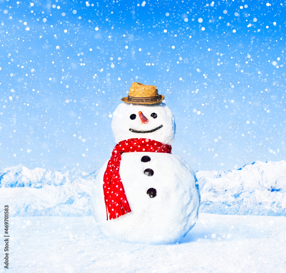 Fototapeta premium Real snowman outdoors in white scenery.