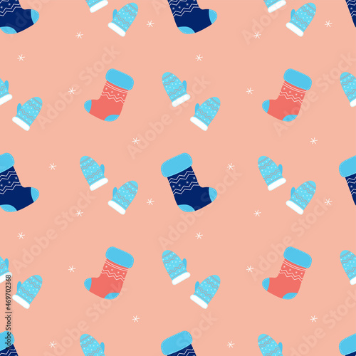 Christmas seamless pattern with christmas socks, snowflakes, mittens. New year background. Vector illustration
