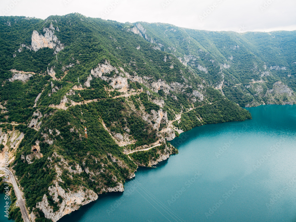 Roads along the mountain ranges over Lake Piva. Montenegro