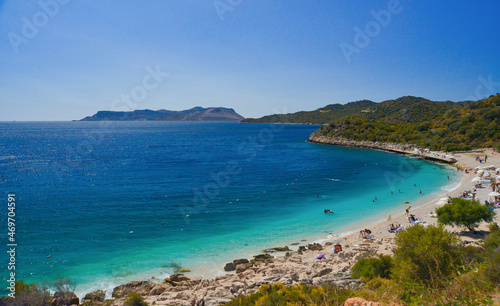 Kas Bilediesi public beach with crystal clear turquose sea water. Antalya, Turkey,