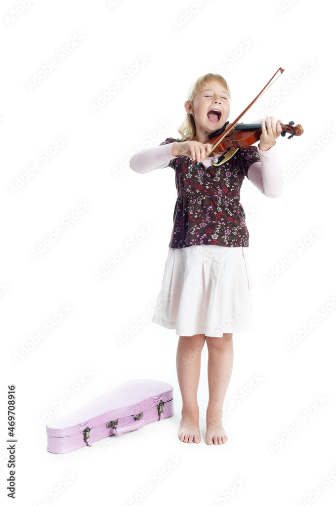 Beautiful little girl playing on violin. Isolated on the white background. Beautiful little girl playing on violin. Isolated on the white background.