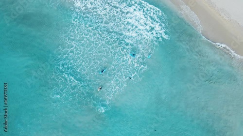 Surfing in blue sea at smith beach, Dunsborough, South West, Western Australia photo