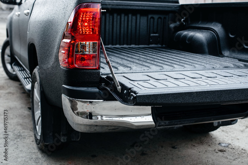 Close-up of an open trunk of a car with a reliable coating