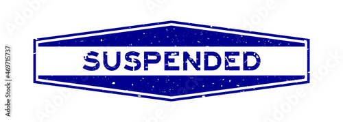 Grunge blue suspended word hexagon rubber seal stamp on white background