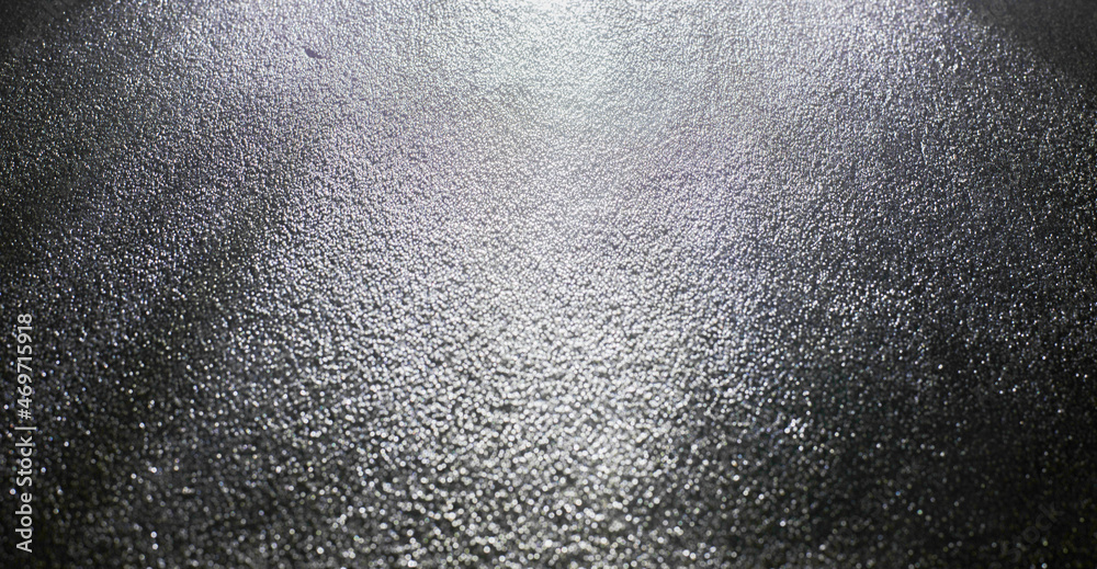 Light and shadow on a gray-black background. Light and shadow on a gray-black background.