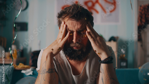 Photography Drunk man suffering from hangover