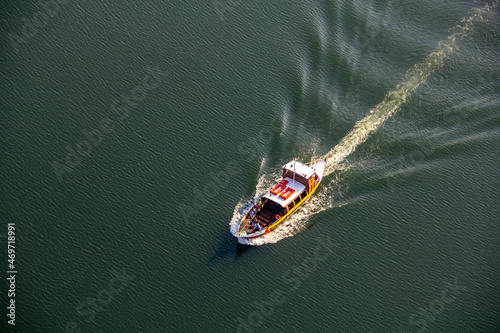 Rabelo boat sailing on the Douro river seen from the sky photo