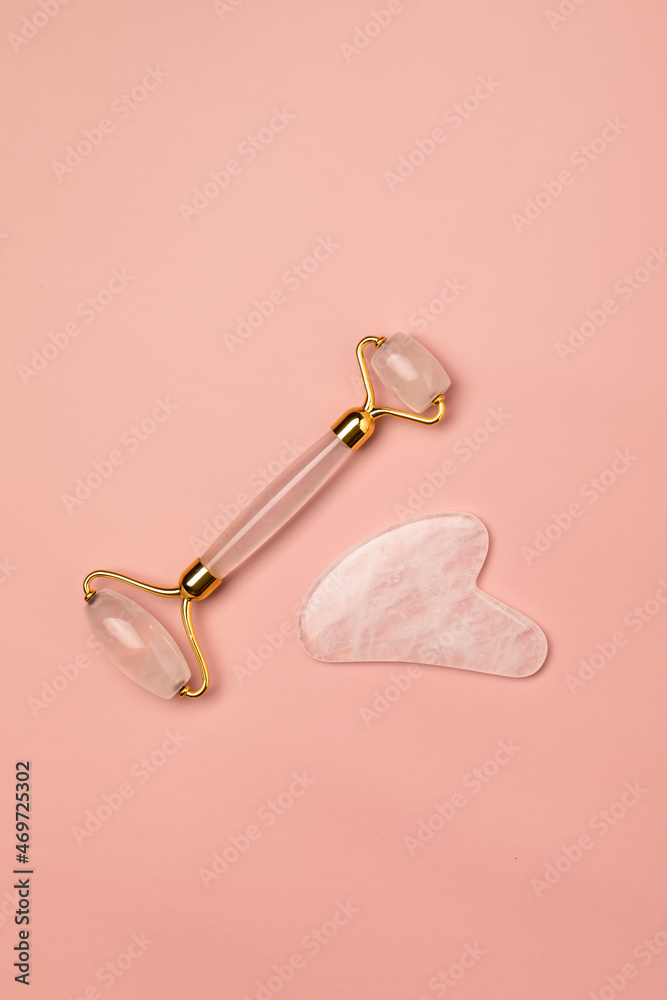 Gua sha facial massage roller. Anti age, lifting, toning face treatment at home. Skin care concept. Copy space. Gua sha facial massage roller. Anti age, lifting, toning face treatment at home. Skin care concept. Copy space.