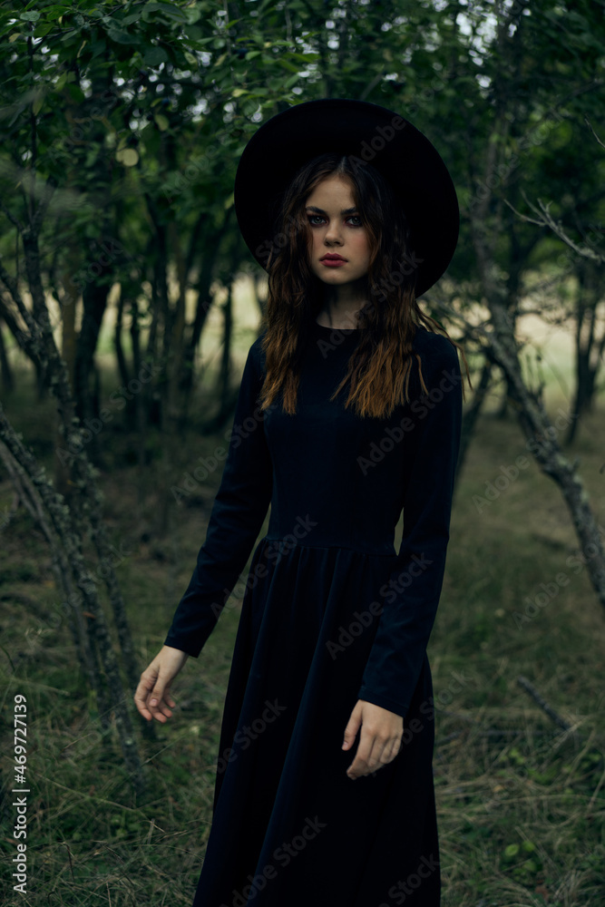 witch in the woods posing costume halloween gothic style witch in the woods posing costume halloween gothic style