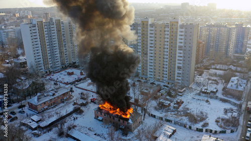 Fire in the house. An apartment building in Irkutsk is on fire. A flame of fire engulfed the building.