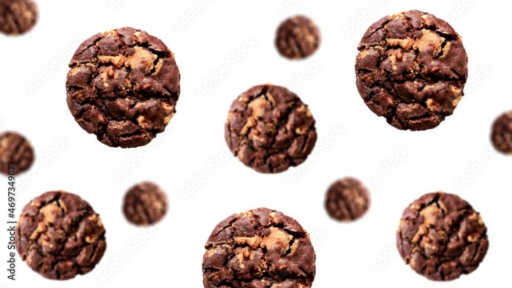 A stream of Collection chocolate chip cookies of different diameters on a white color background. 4K UHD footage. Futuristic design, motion design animation. Pop art design, creative Christm A stream of Collection chocolate chip cookies of different diameters on a white color background. 4K UHD footage. Futuristic design, motion design animation. Pop art design, creative Christm