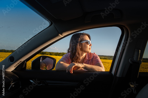 woman stop to enjoy sunset at road trip © phpetrunina14