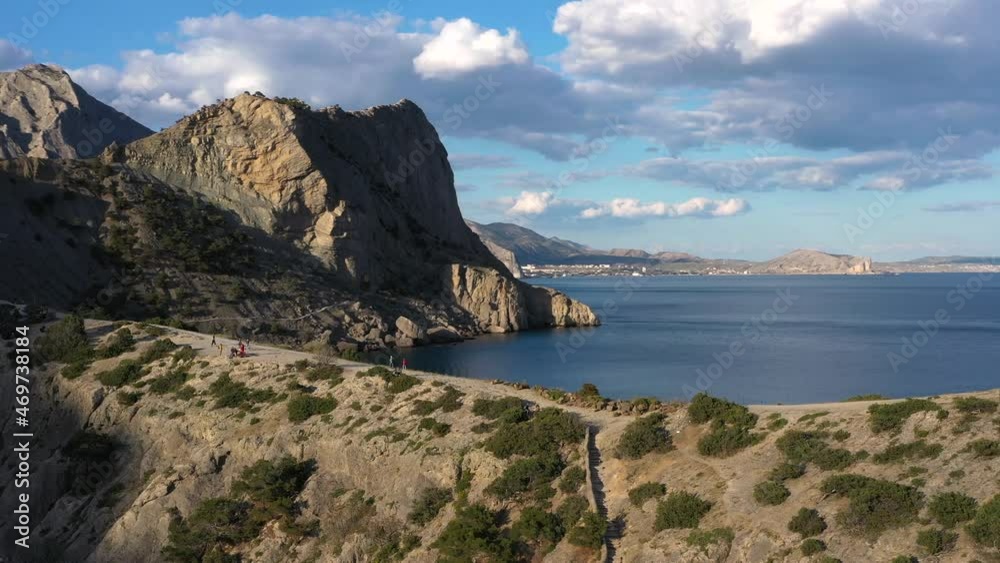 Narrow promontory Capchik by the sea. A beautiful cape with trails and rocks on it. Narrow promontory Capchik by the sea. A beautiful cape with trails and rocks on it.