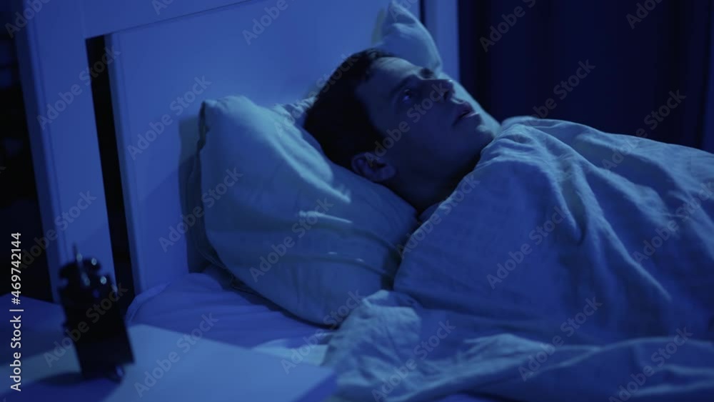 A man suffers from insomnia A man suffers from insomnia