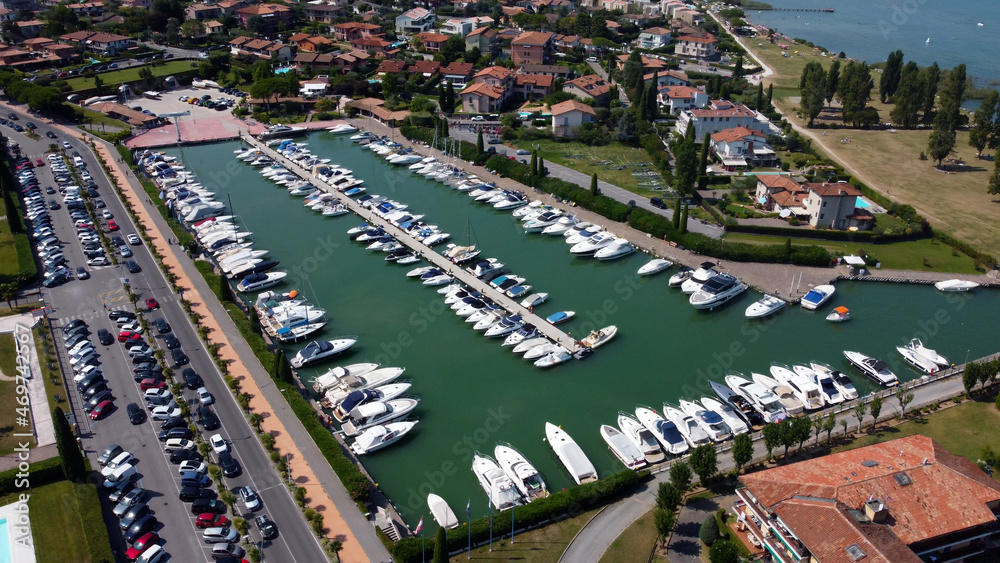 The view of the boats in the city of Sirmione in Lake Grande Italy