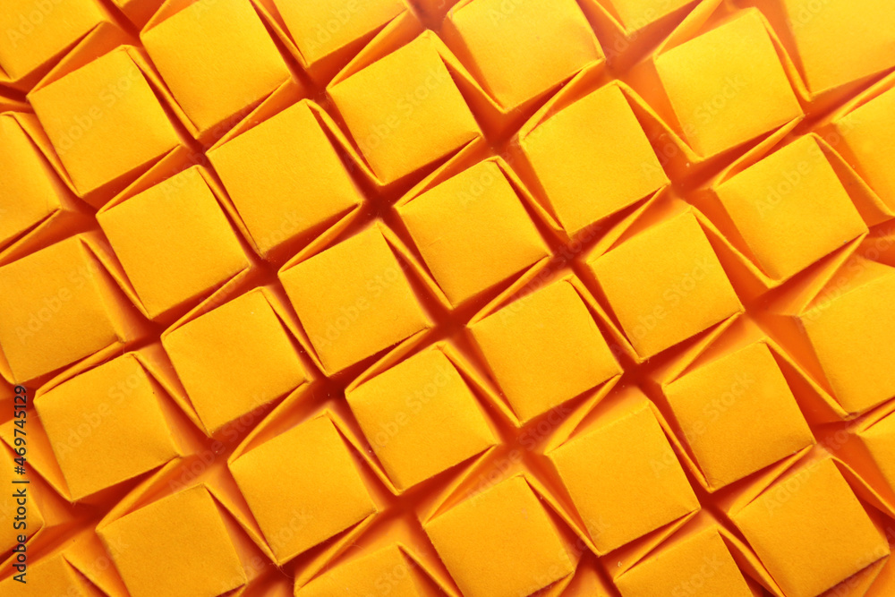 origami square tessellation - yellow paper macro - close up - screen background origami square tessellation - yellow paper macro - close up - screen background