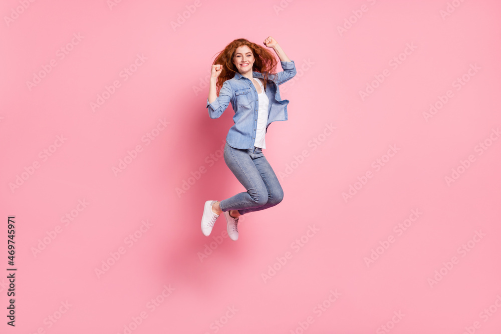 Full size photo of happy nice pretty cute young woman jump up air winner lucky isolated on pink color background