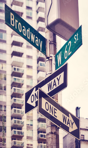 One Way traffic signs at Broadway road, color toning applied, New York City, USA.