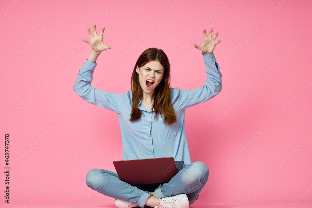 woman with laptop on pink background online shopping entertainment woman with laptop on pink background online shopping entertainment