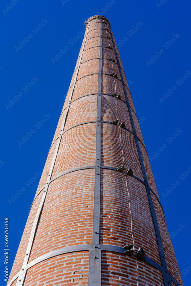 Tall brick chimney in Castelo Branco Portugal