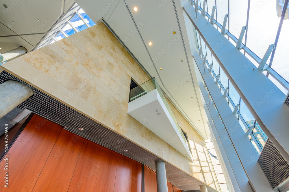 Obraz premium Abstract fragment of the architecture of modern lobby, hallway of the luxury hotel, shopping mall, business center in Vancouver, Canada. Interior design.